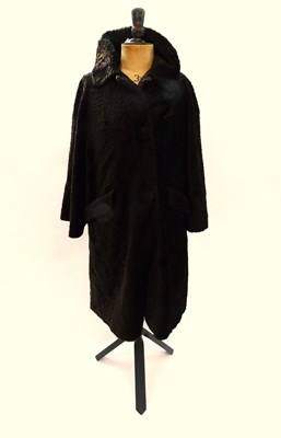 Lot 164 - A mid 20th century brown astrakhan fur coat,...