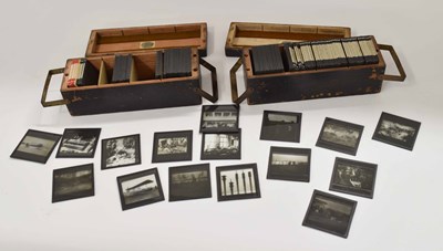 Lot 107 - Two boxes of magic lantern slides depicting...