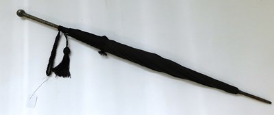 Lot 29 - A lady's silver handled black umbrella, handle...