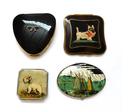 Lot 215 - Four compacts: to include a black enamel...