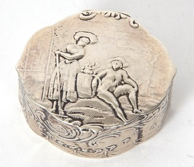 Lot 112 - A white metal Dutch oval shaped box embossed...