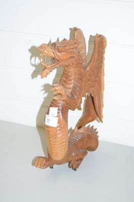 Lot 39 - FAR EASTERN CARVED HARDWOOD MODEL DRAGON