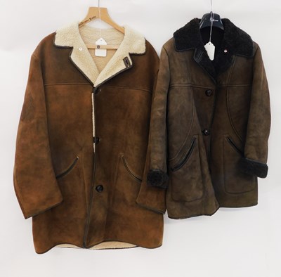 Lot 281 - Two sheepskin coats, both with leather buttons,...