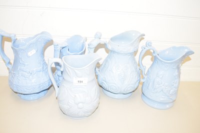 Lot 151 - FIVE VICTORIAN PALE BLUE GLAZED JUGS