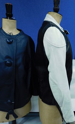 Lot 95 - Two leather jackets, one black and cream biker...