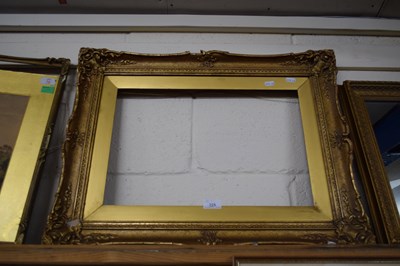 Lot 225 - GILT FOLIATE MOULDED PICTURE FRAME, 64CM WIDE