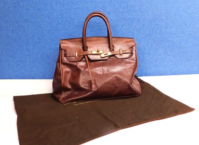 Lot 233 - A chestnut brown leather bag by Maxwell Scott,...