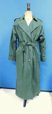 Lot 153 - A lady's green Burberry trenchcoat, double...