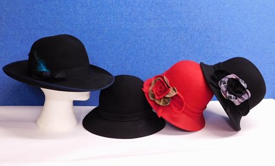 Lot 196 - Four lady's hats, to include a black wool felt...