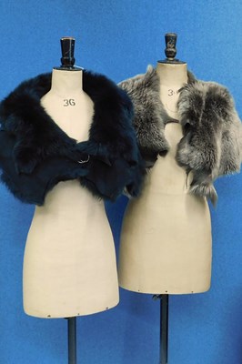 Lot 189 - Two sheepskin wraps, one in black by Claudia...