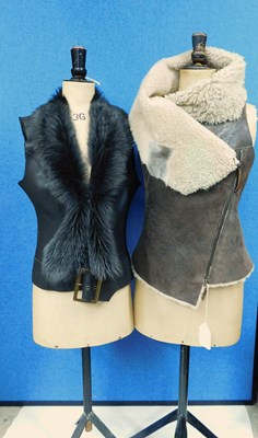 Lot 131 - Two lady's gillets, to include a brown leather...