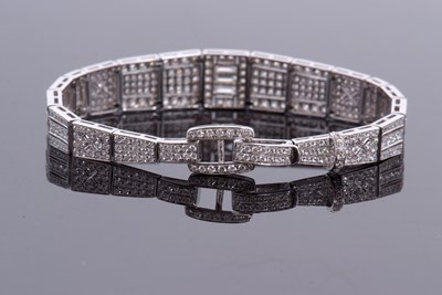 Lot 365 - An 18ct white gold and diamond set Art Deco...