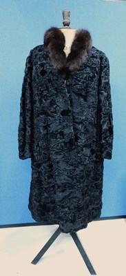 Lot 163 - A lady's black Astrakhan fur coat by Claude...