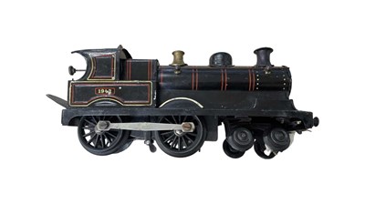 Lot 29 - A Bing/Bassett-Lowke 0 gauge 4-4-0 Locomotive...