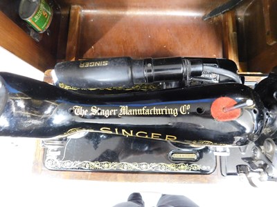 Lot 16 - A c.1934 knee operated Singer sewing machine,...