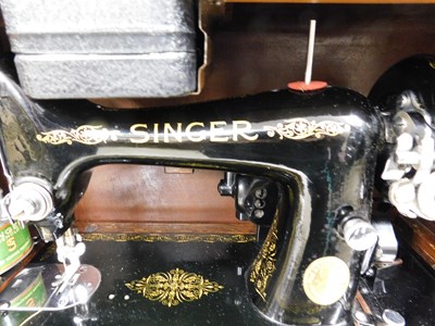 Lot 16 - A c.1934 knee operated Singer sewing machine,...