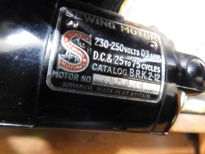 Lot 16 - A c.1934 knee operated Singer sewing machine,...