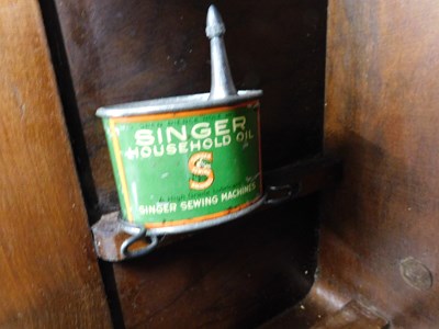 Lot 16 - A c.1934 knee operated Singer sewing machine,...