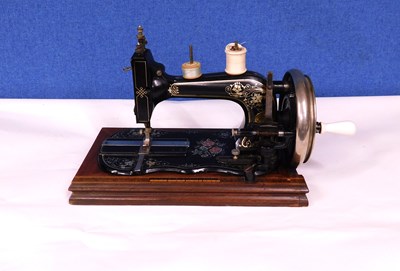 Lot 13 - A late 19th century hand turned sewing machine