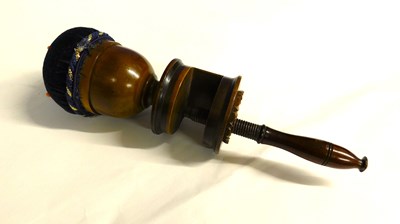 Lot 5 - A late 19th century fruitwood sewing clamp...
