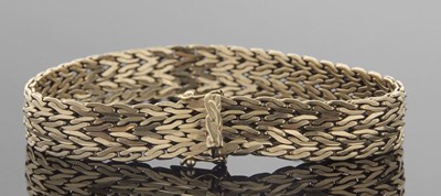 Lot 376 - A 14ct gold bracelet, the flat herringbone...