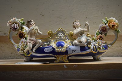 Lot 635 - An ornate bowl with floral encrusted...