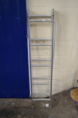 Lot 670 - A small aluminium loft ladder