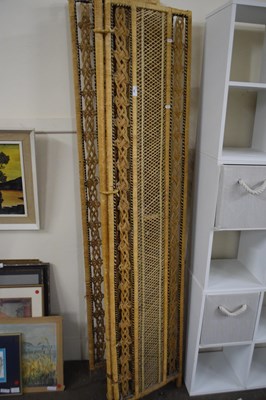 Lot 707 - A cane three piece screen