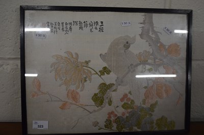 Lot 323 - Small Oriental needlework picture of a parrot,...