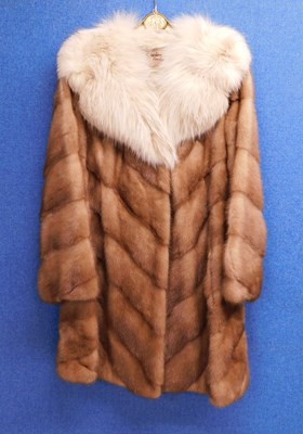 Lot 184 - A lady's fur coat by Zwirn, London, the 3/4...