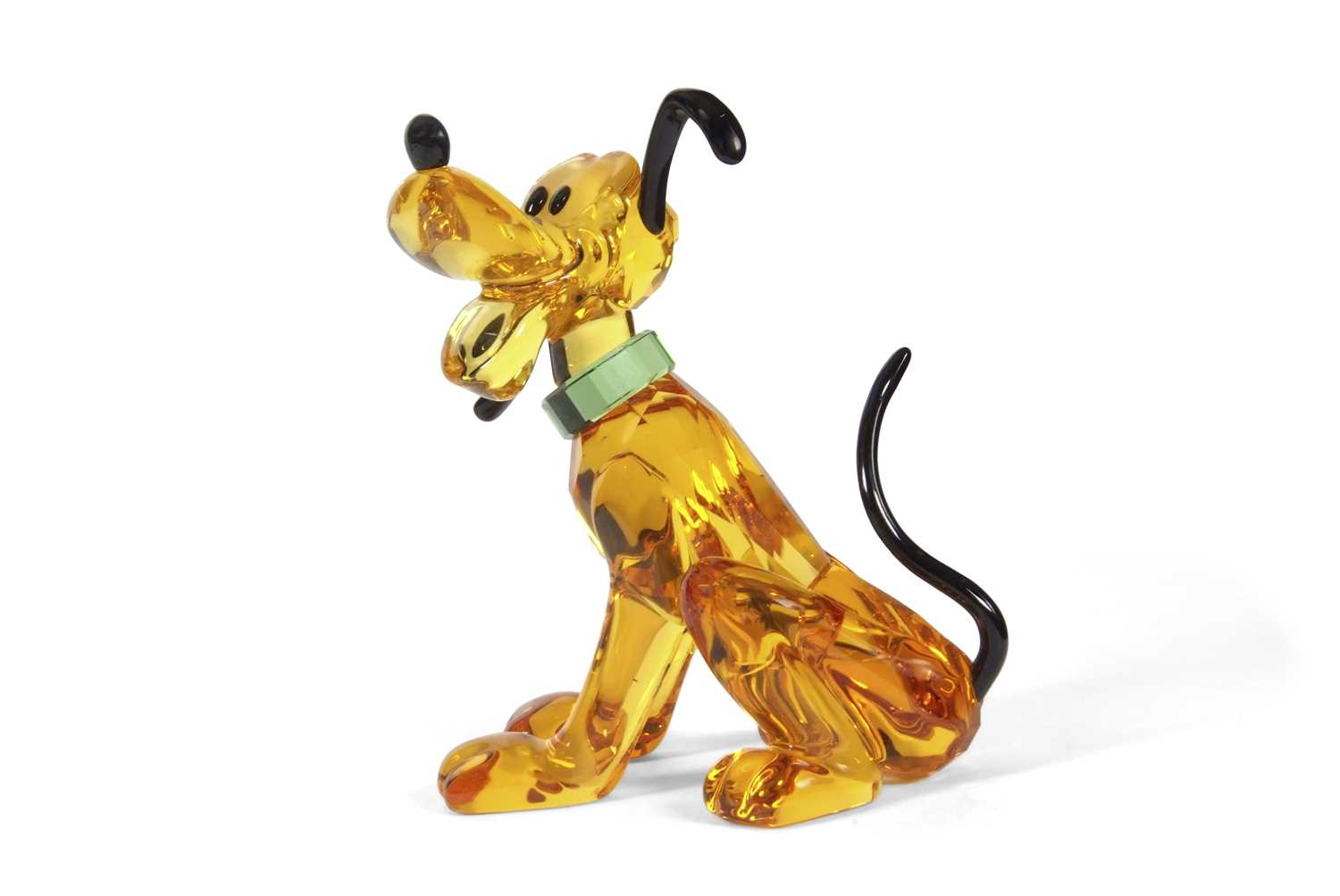 Lot 2 - A Swarovski Disney figure of Pluto with yellow...