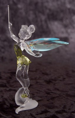Lot 4 - A Swarovski Disney figure of Tinkerbell in...