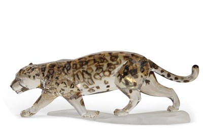 Lot 5 - A Swarovski model of a leopard on shaped...