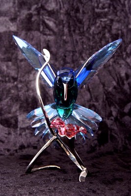 Lot 8 - A Swarovski model of a hummingbird in blue and...