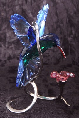 Lot 8 - A Swarovski model of a hummingbird in blue and...