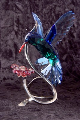 Lot 8 - A Swarovski model of a hummingbird in blue and...