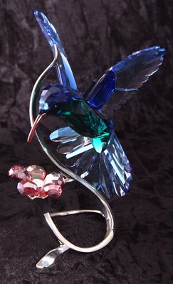 Lot 8 - A Swarovski model of a hummingbird in blue and...