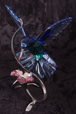 Lot 8 - A Swarovski model of a hummingbird in blue and...