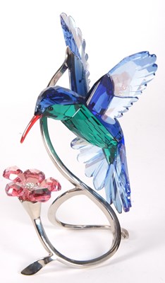 Lot 8 - A Swarovski model of a hummingbird in blue and...