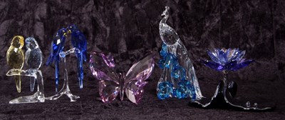 Lot 10 - A group of Swarovski coloured models of a pair...