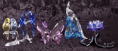 Lot 10 - A group of Swarovski coloured models of a pair...