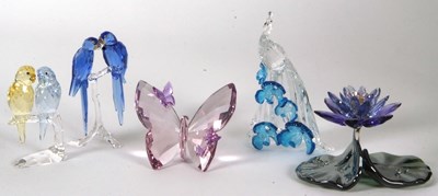 Lot 10 - A group of Swarovski coloured models of a pair...