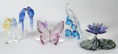 Lot 10 - A group of Swarovski coloured models of a pair...