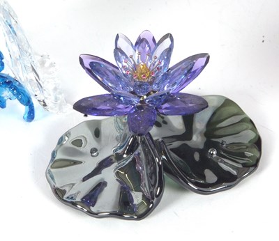 Lot 10 - A group of Swarovski coloured models of a pair...