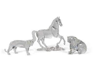 Lot 11 - A Swarovski model of a prancing horse on...