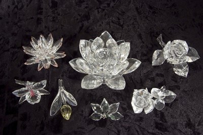 Lot 13 - A group of Swarovski crystal flowers including...