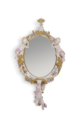 Lot 26 - An oval mirror in continental porcelain frame,...