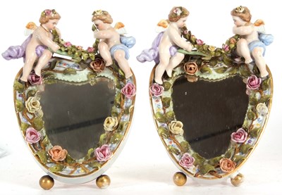 Lot 26 - An oval mirror in continental porcelain frame,...