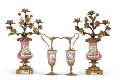 Lot 78 - A pair of 19th century Sevres style candelabra...