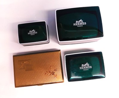 Lot 218 - A lady's gilt metal compact, of rectangular...